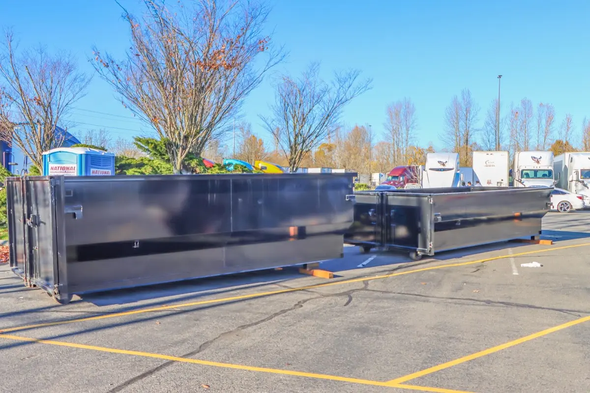 Professional dumpster rental service with roll-off container on residential driveway in Irmo